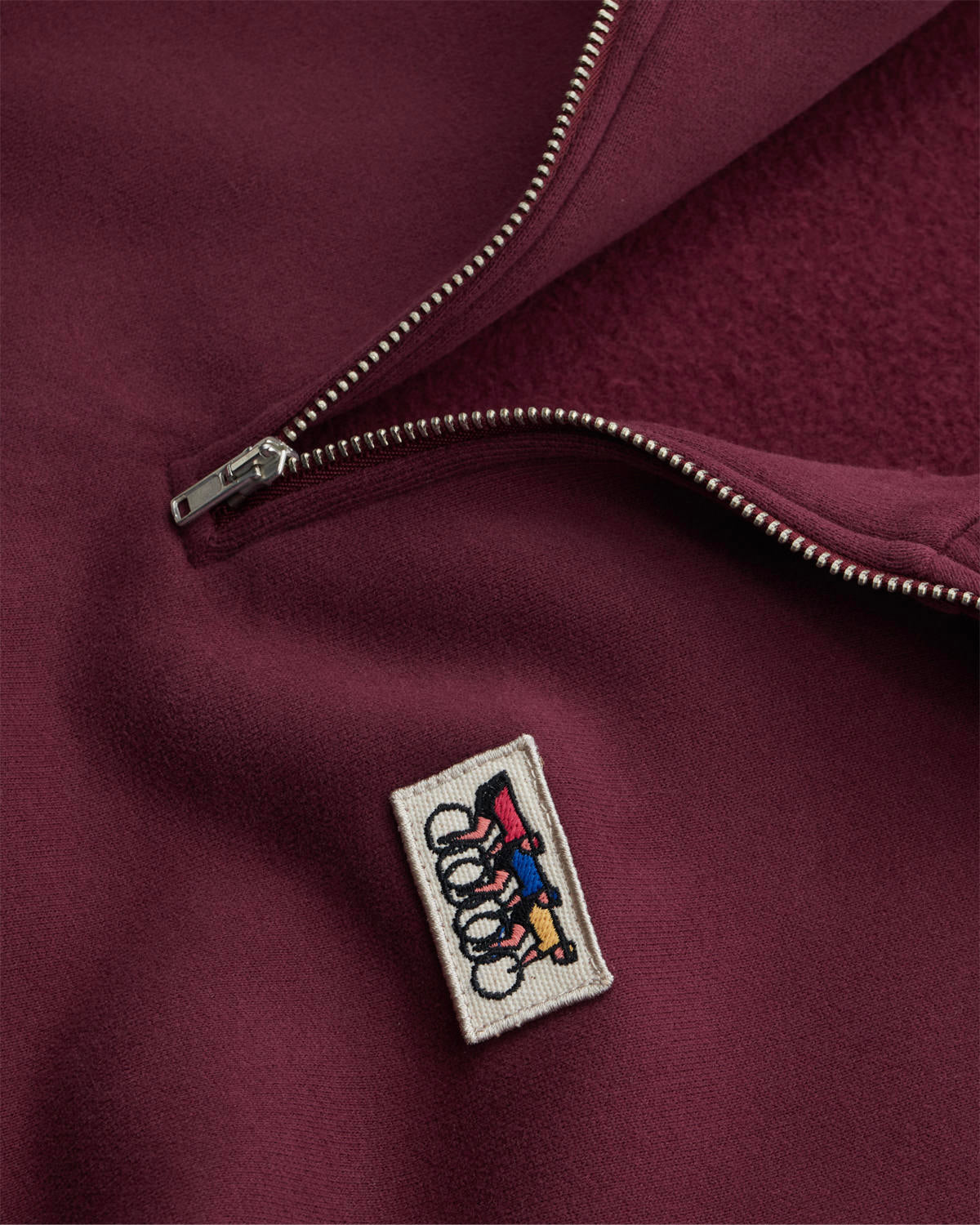 Close-up of the fig zip sweatshirt