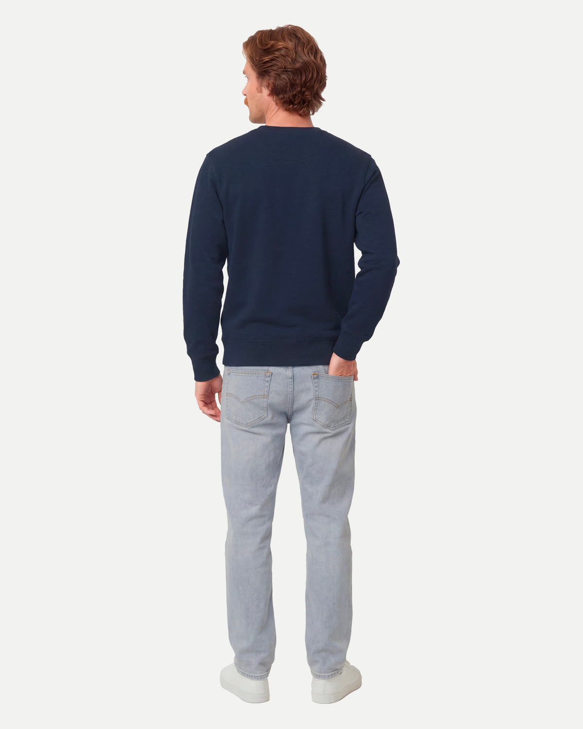 Model wearing the navy Waaier sweatshirt, seen from the back