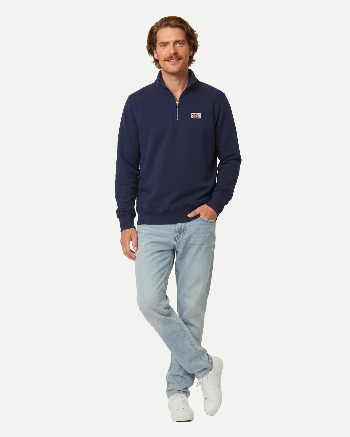 Model wearing the navy zip sweatshirt